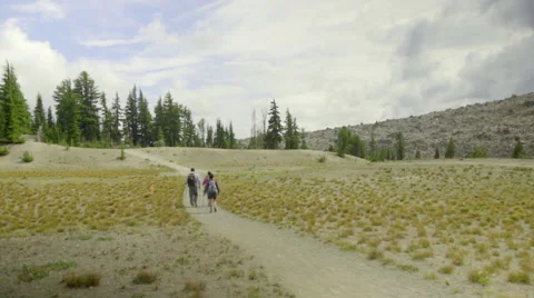 Wide shot of hikers on mountain trail Stock Footage 59063360
