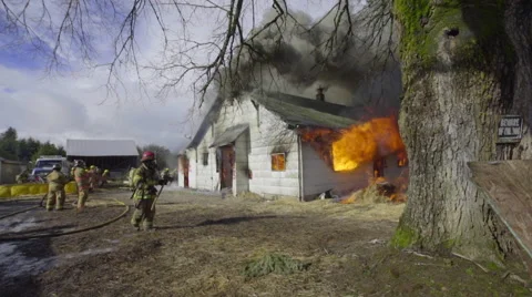 Wide shot of house on fire Stock Footage 60983231