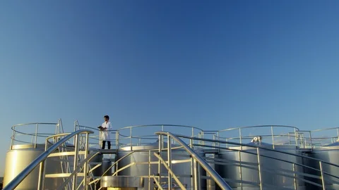 Wide Shot, Lockdown, 20 Seconds Or Greater, Standing, Writing, Outdoors, Day, Stock Footage 95861074