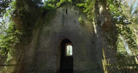 Wide shot looking up the bell tower of the derelict Saint Mary's church within Vídeos de archivo 308220749