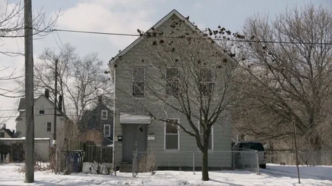 Wide Shot of Middle Class Home in Winter Cleveland, Ohio Stock Footage 89944995