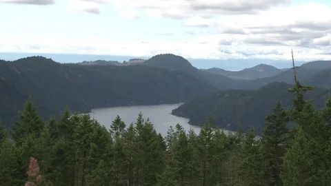 Wide shot of ocean view with mountain range Stock Footage 75239795