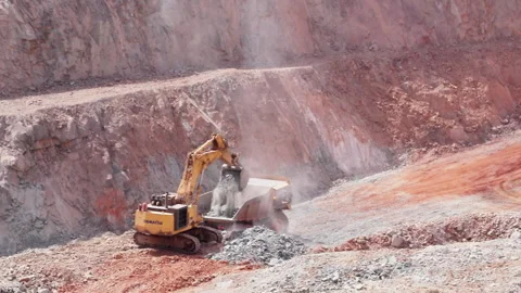 Wide shot of open-pit mining operations Stock Footage 241213504