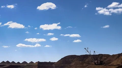 Wide shot of operating mine with dragline excavators loading ore in the Stock Footage 75458513