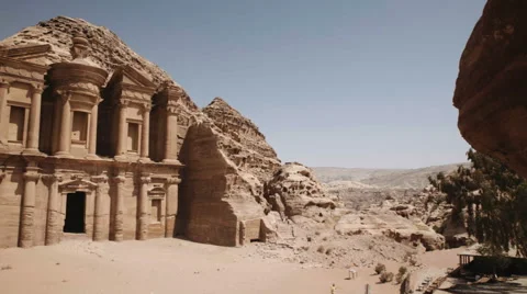 A wide shot pan of the Monastery building in Petra Stock Footage 61200708
