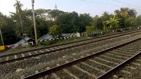 Wide shot of parallel railway lines from a moving train. Stock Footage 236132922