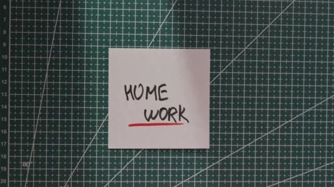 Wide shot of placing Homework paper note on grid mat Stock Footage 341269448