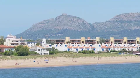 Wide shot of Platja de Pals beach in Begur, Spain, featuring a sandy coastline Stock Footage 346721764