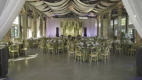 Wide shot push in dolly beautiful event setup ready for wedding party catering Stock Footage