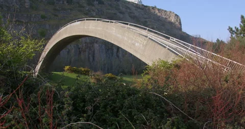 Wide shot of the rainbow bridge over the A55. Taken from the north side of the Stock Footage 346191383