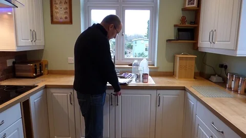 Wide shot of recycling in kitchen bin Video stock 85393676