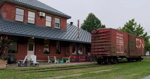 Wide shot of rusty abandoned train on tracks Stock Footage 205540882