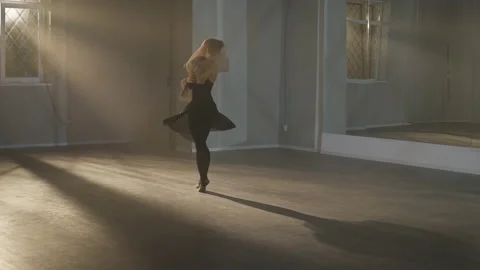 Wide shot of slim talented ballerina rehearsing dance with beige scarf in ballet Vídeos de archivo 158717075