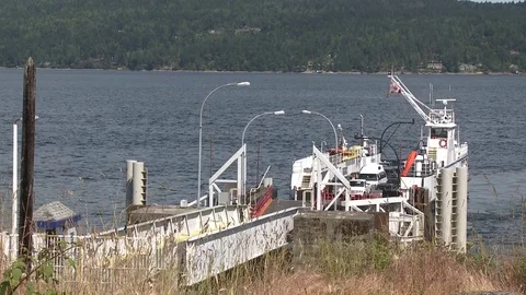Wide shot of a small ferry docking Video stock 75242047