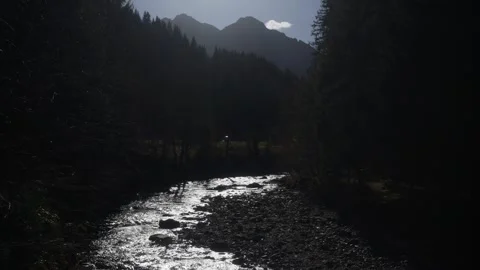 Wide shot of a small river in the Alps of Austria, near German border Stock Footage 300844858