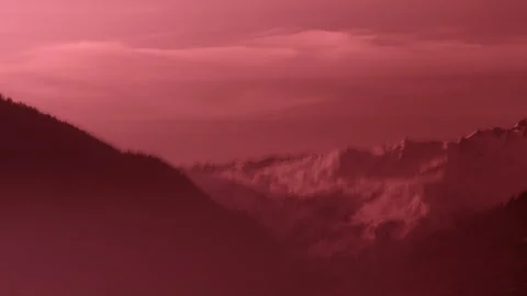 Wide Shot Snowy Mountain Range Cloudy Sky Pink Twilight Stock Footage 329237734