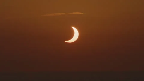 Wide Shot of Solar Eclipse at Sunset 스톡 동영상 343102360
