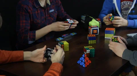 Wide Shot of solving the Rubik's Cube puzzle Stock Footage 49955236
