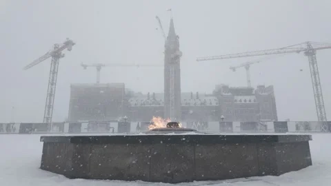Wide shot Static of Centennial Flame During Blizzard Stock Footage 325783987