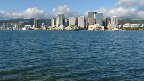 Wide-shot static shot of Honolulu seen from across the harbor Stock Footage 244087639