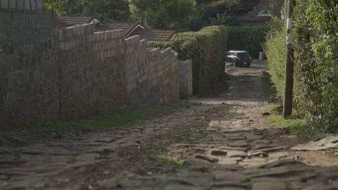 Wide Shot of A Stoned Brick Pathway in Nairobi, Kenya Video stock 243683396