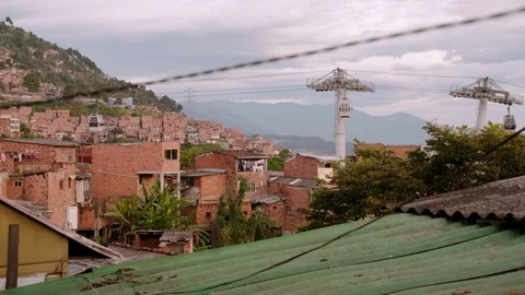 Wide shot in the streets of Comuna 13, a slum in Medellin, Colombia Stock Footage 105029271