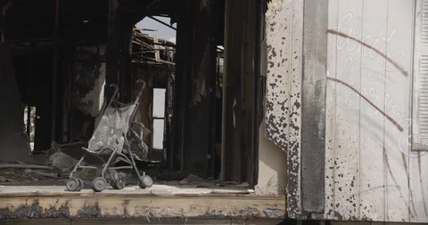 Wide Shot of Stroller Inside Burnt Out Home Stock Footage 89942249