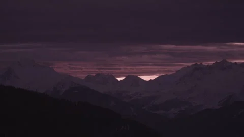 Wide Shot Sun Breaking Through Clouds Mountain Valley Golden Dusk Video stock 329240205
