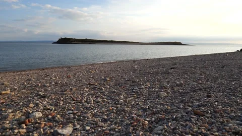 Wide Shot Of Sunset Over Tidal Island 4K Slow Motion Stock Footage 212076498