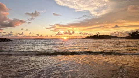Wide shot of sunset waves on a beautiful Sri Lanka beach at nighttime Stock Footage 339903578