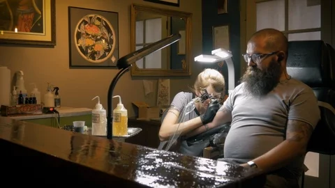 Wide Shot of a Tattoo Studio in 4k Stock Footage 97950812