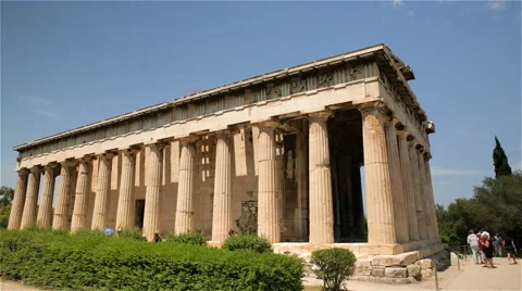 A wide shot of the Temple of Hephaestus in Ancient Agora of Athens, Greece Stock Footage 64409536