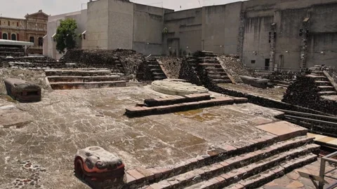 Wide Shot Templo Mayor Aztec Pyramid Ruins Stone Serpent Heads Mexico City Video stock 344627490