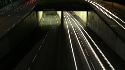 Wide shot of traffic speeding through Queensway tunnels in Birmingham. Stock Footage 64709597