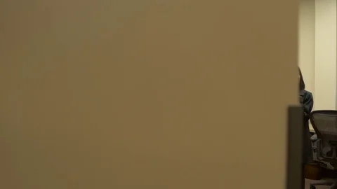 Wide shot of two dentists looking at a tablet Stock Footage 76217550