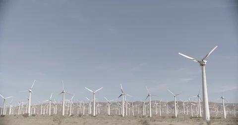 Wide Shot of Wind mIll Farm at Base of California Foothills Stock Footage 89942475