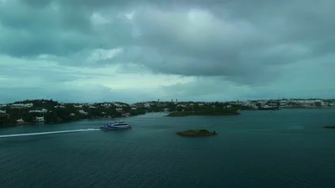 Wide Side-Approach Shot of Bermuda Ferry in Hamilton Harbour 動画素材 197009223