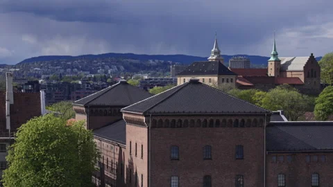Wide Slow Motion View of Akershus Fortress Overlooking the Oslo Waterfront Stock Footage 309423522