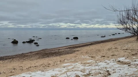 Wide Snowy Beach And Distant Rocks Stock Footage 322051935