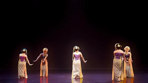 Wide Stage Performance Featuring Traditional Female Dancers Stock Photos