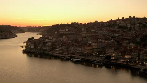 Wide static clip of Bairro da Ribeira in Porto at sunset Stock Footage 121094893