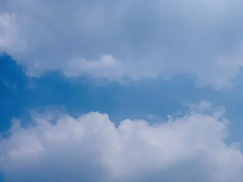 Wide Static Cloudscape and Blue Sky Over Jakarta Indonesia Stock-Fotos