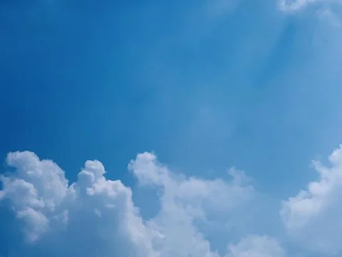 Wide Static Cloudscape and Blue Sky Over Jakarta Indonesia Stock Photos