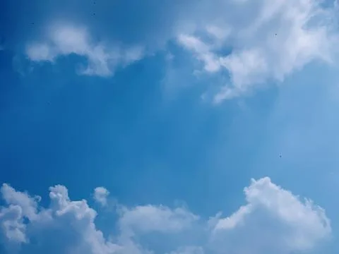 Wide Static Cloudscape and Blue Sky Over Jakarta Indonesia Stock Photos