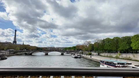 Wide Static Shot of Eiffel Tower and Seine River from Pont Alexandre III Vídeos de archivo 332602135