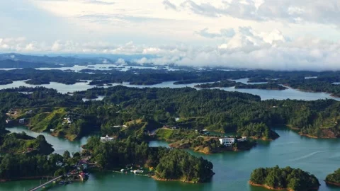 Wide Static Shot of Guatape Dam Landscape with Low Clouds Stock Footage 345044987