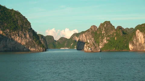 Wide Static Shot of Massive Karst Mountains and Calm Sea in Ha Long Bay Stock-Footage 330978000