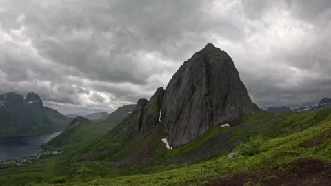Wide static shot of Segla mountain peak with fjord village view in Senja Norway Vidéo 342059381