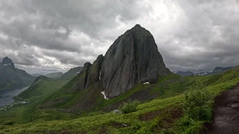 Wide static shot of Segla mountain peak with fjord village view in Senja Norway Vidéo 342059382