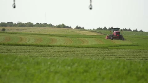 Wide Static of a Swather from Behind (1) Stock Footage 221863000